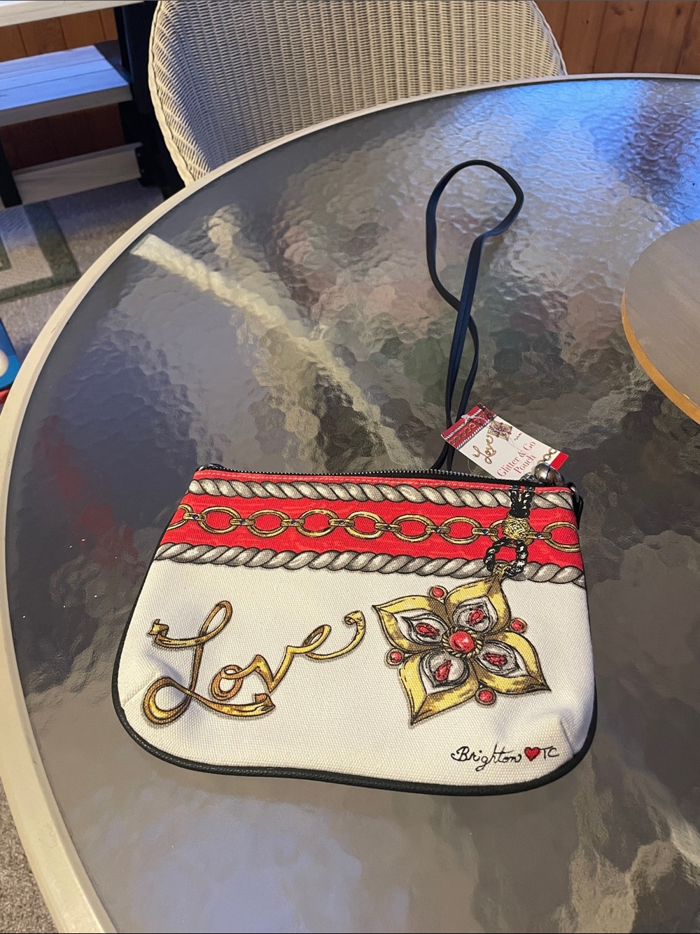 Brighton White and Red 'Love' Wristlet with Gold Accents.